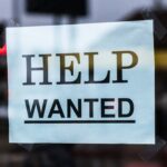 A help wanted sign representing a lack of construction workers due to a skill shortage
